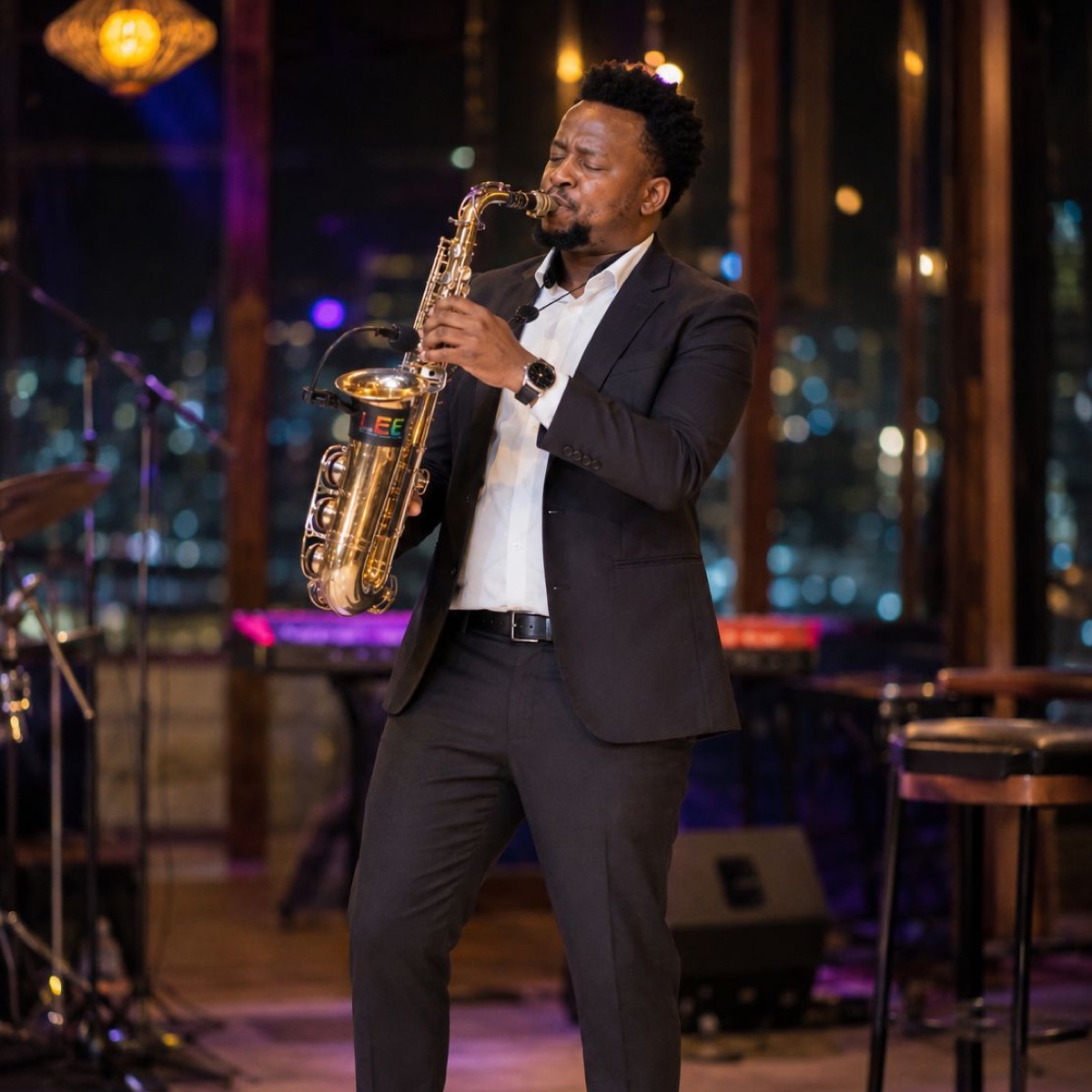 Lee performing live with a saxophone